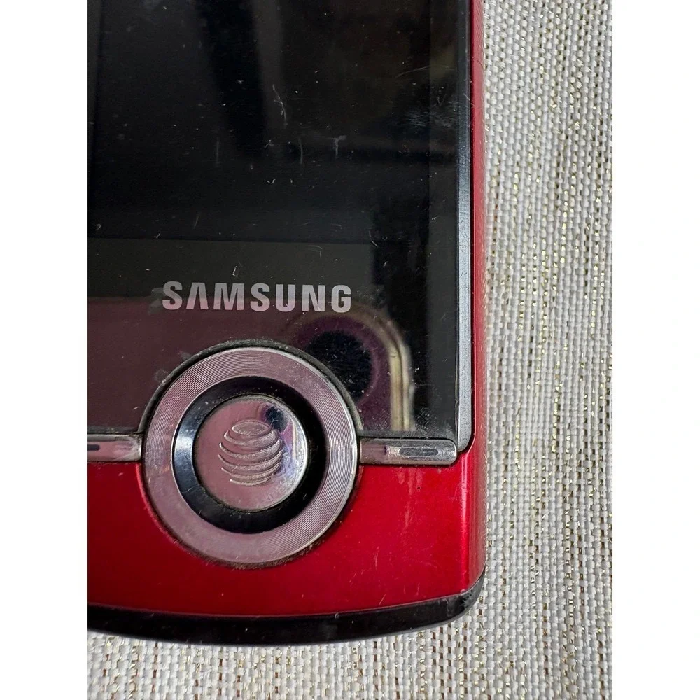 red Samsung SGH-A777, a 3G slider phone